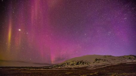 Enchanting Aurora Borealis Showcasing the Night Sky wallpaper