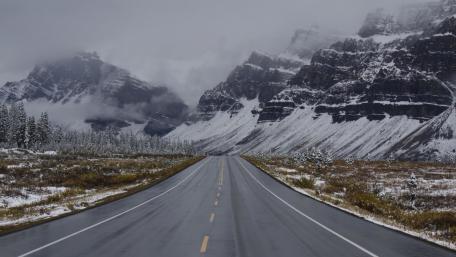 Frozen Journey Through Majestic Mountains wallpaper