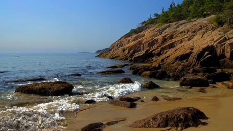 Serene Coastal Haven Displaying Nature's Beauty wallpaper