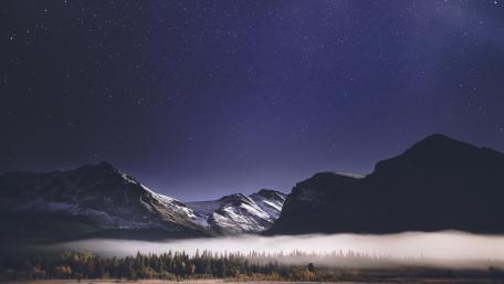 Majestic Mountains Under a Starry Sky wallpaper
