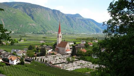 Serene Village Nestled in the Mountains wallpaper