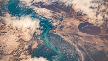 Serene Aerial View of a Winding River wallpaper
