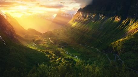 Golden Rays Over Majestic Valley Landscape wallpaper