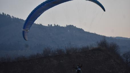 Soaring High in the Sky with Paragliding wallpaper