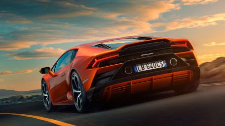 Sleek Red Lamborghini Huracan EVO in Sunset Glow wallpaper