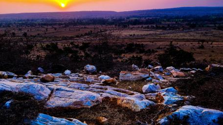 Serene Sunset Over Rolling Hills wallpaper