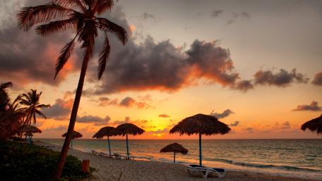 Tropical beach at sunset wallpaper