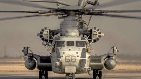 Powerful Military Helicopter in Operational Readiness wallpaper