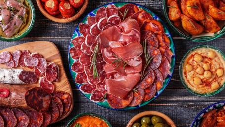 Delicious Assortment of Gourmet Cold Cuts wallpaper