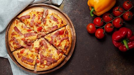 Delicious Italian Pizza with Fresh Ingredients wallpaper