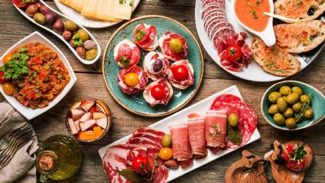 Delicious Brunch Spread with Cold Cuts and Appetizers wallpaper