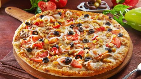 Pizza Perfection Loaded with Italian Flavors wallpaper