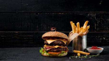 Delicious Burger and Fries Delightful Combination wallpaper