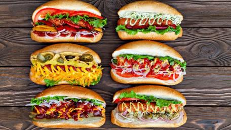 Colorful Hot Dogs on Rustic Wood Planks wallpaper