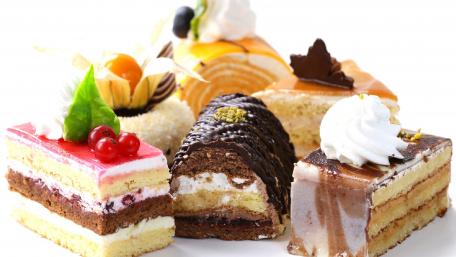 Delightful Assortment of Cakes and Confections wallpaper