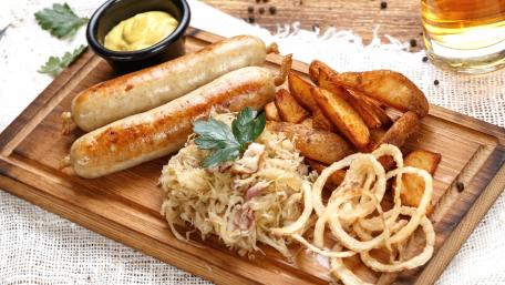 Delicious German Bratwurst and Sauerkraut Feast wallpaper