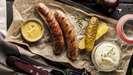 Savory Bratwurst Delightful Meal Experience wallpaper