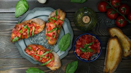 Delicious Bruschetta with Fresh Tomatoes and Basil wallpaper