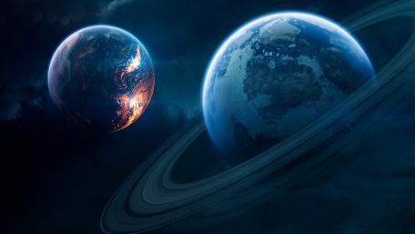 Majestic Ringed Planet Adorning the Cosmos wallpaper