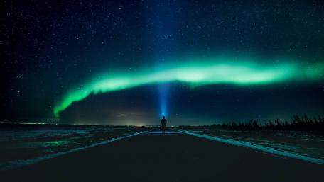Aurora Borealis on a Serene Night Road wallpaper