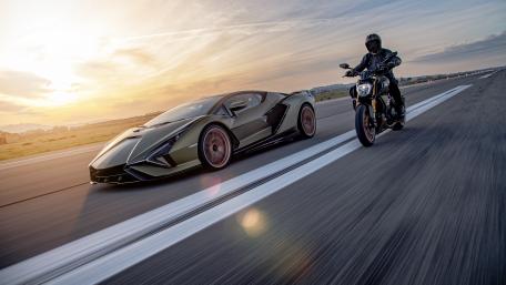 Ultimate Speed: Supercar and Motorbike Showdown wallpaper