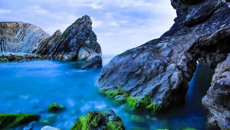 Majestic Rock Formations by the Blue Sea wallpaper