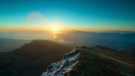 Sunrise Over Serene Mountain Panorama wallpaper