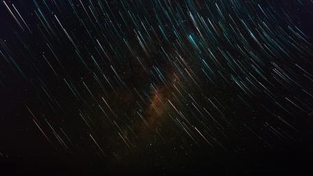 Cosmic Star Trails Spectacle wallpaper