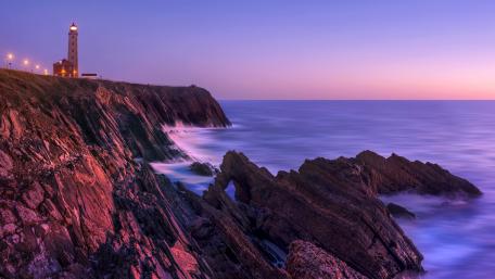Twilight Beacon at Rocky Shore wallpaper