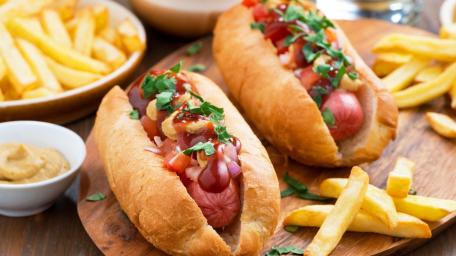 Delicious Street Style Hot Dogs and Fries Showcase wallpaper
