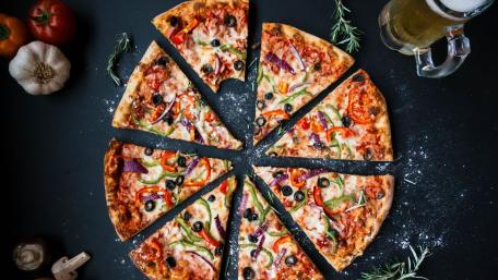 Deliciously Tempting Italian Pizza Slices in 4K Quality wallpaper