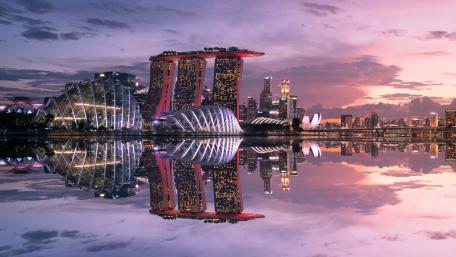 Singapore reflected in the water at sunset wallpaper