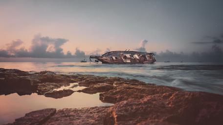 Eerie Serenity of an Abandoned Shipwreck wallpaper