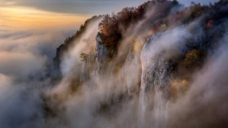 Majestic Cliff Above the Clouds wallpaper