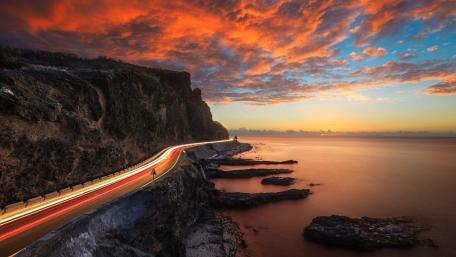 Scenic Coastal Highway at Sunset Moments wallpaper