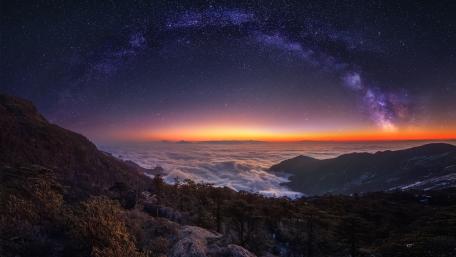 Majestic Milky Way Above the Clouds wallpaper