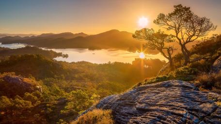 Serene Sunset Over Tranquil Landscape wallpaper