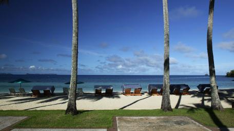 Serene Beachfront Relaxation Scene wallpaper