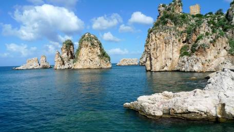 Majestic Sea Stacks Against a Clear Sky wallpaper