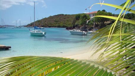 Tranquil Sailboat Paradise in a Serene Bay wallpaper