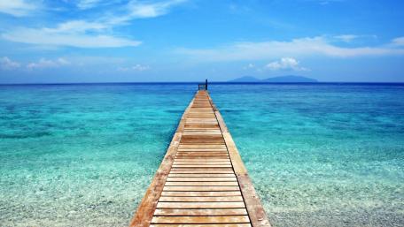 Tranquil Pier Overlooking Serene Waters wallpaper