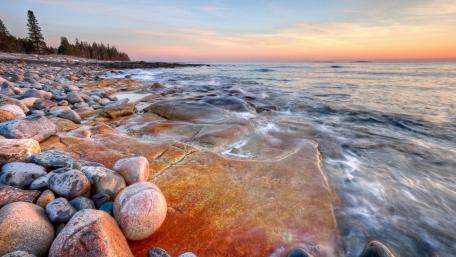 Serene Beachside Pebble Landscape wallpaper