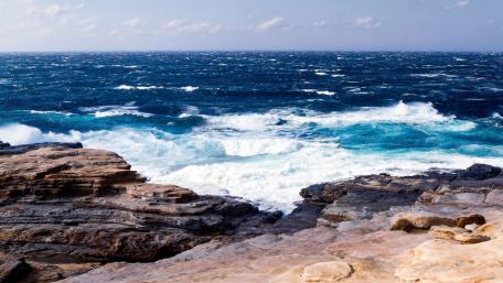 Waves Crashing on Rocky Shore wallpaper