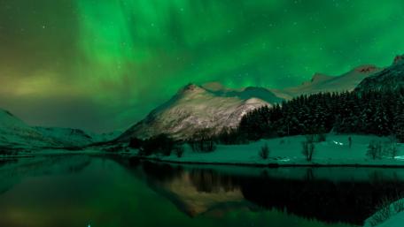 Enchanting Aurora Over Serene Landscape wallpaper