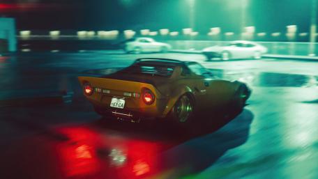 Dynamic Night Drive of a Yellow Mazda RX-7 wallpaper