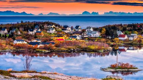 Serene Village Reflection at Sunset wallpaper