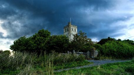 Majestic Castle Under Brooding Skies wallpaper