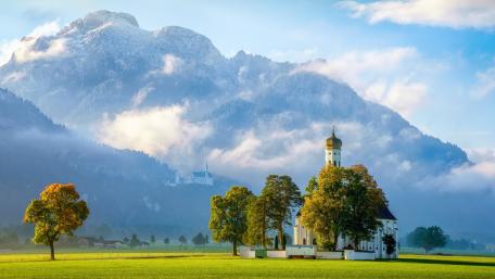 Pilgrimage Church of St. Coloman and the Neuschwanstein Castle on the background wallpaper