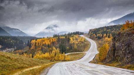 Serene Autumn Road in the Mountains wallpaper