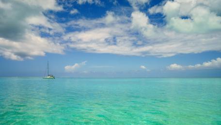 Serene Sailing in Azure Waters wallpaper
